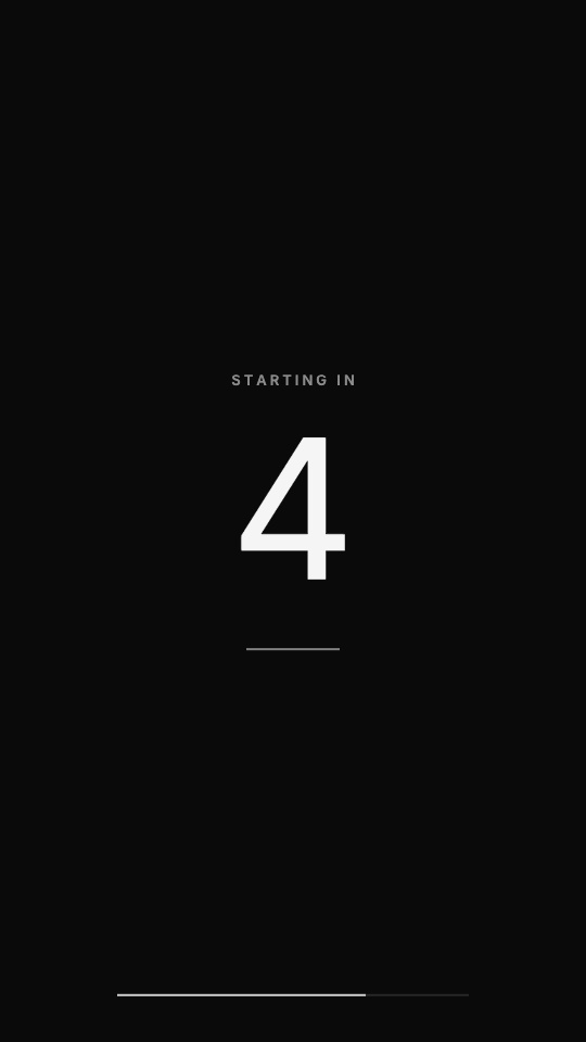 Thin white digits, a hairline and a slim progress line on black. — rendered sample